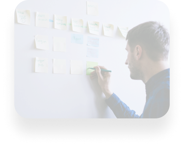 man writing notes
